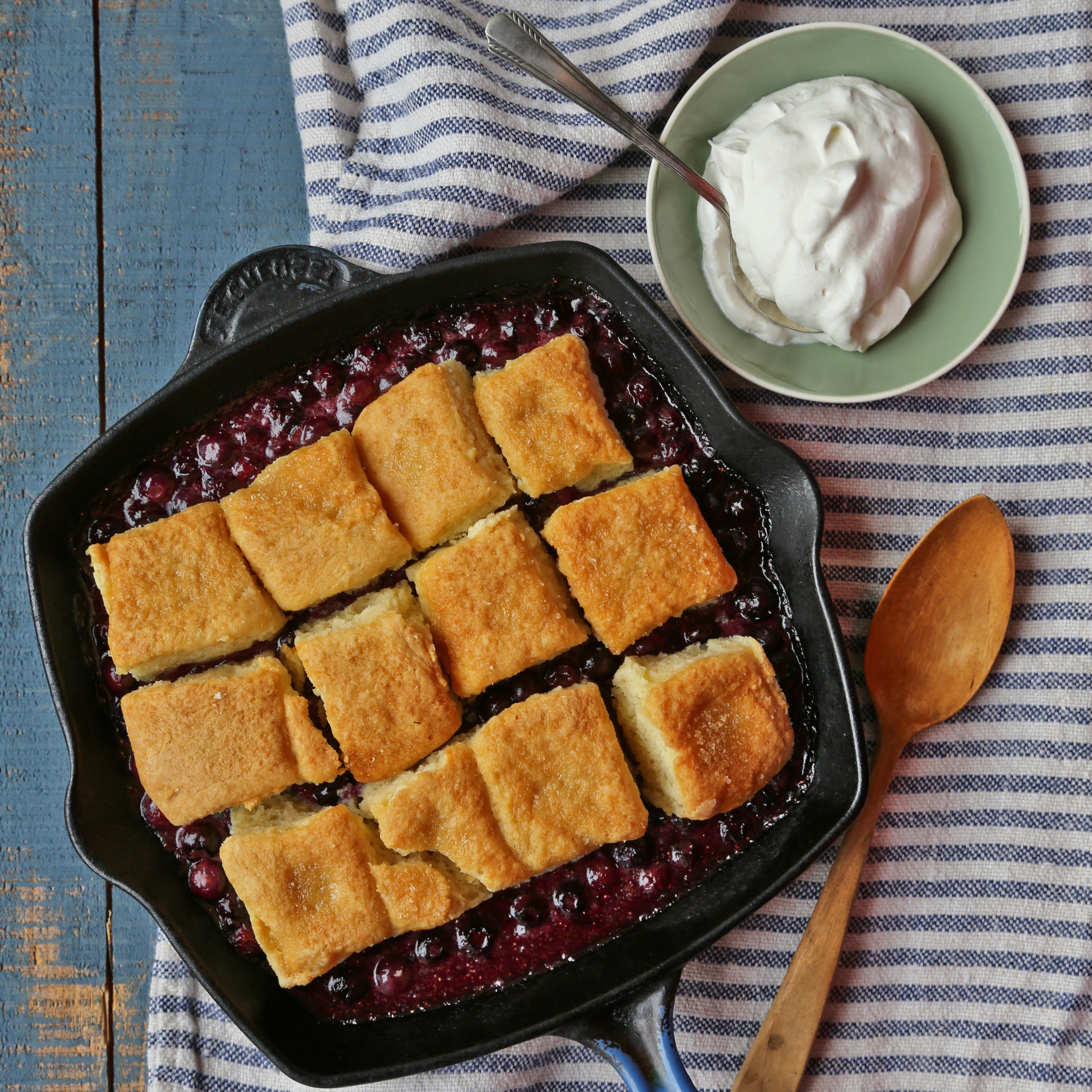 Buttermilk Biscuit Blueberry Cobbler with Whipped Cream